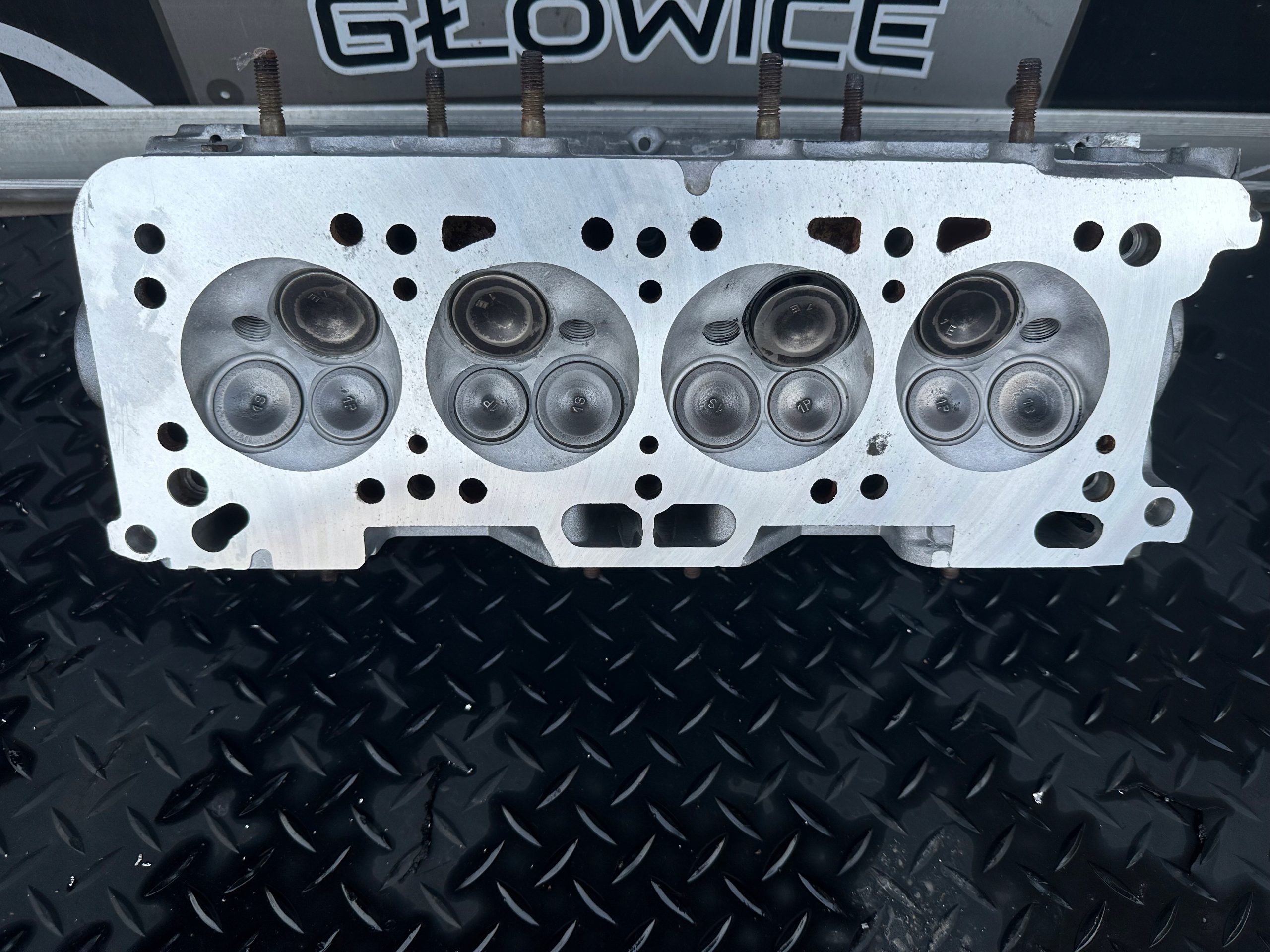 d6d7fcd4fe436294863a5a442a65a5e9-1.jpg Głowica mitshubishi colt 1.3 12v kompletna po regeneracji - obrazek 1